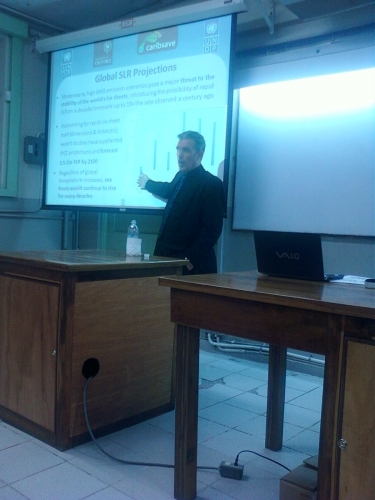 Dr. SImpson showing global sea level rise projections at his public lecture on February 1, 2011